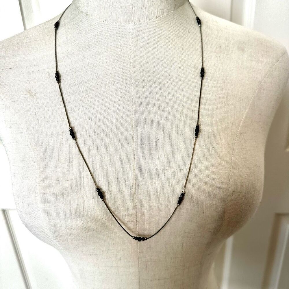 Black and silver tone long beaded necklace